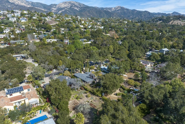 drone / aerial view featuring a mountain view