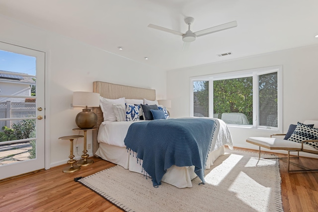 bedroom with wood-type flooring and ceiling fan