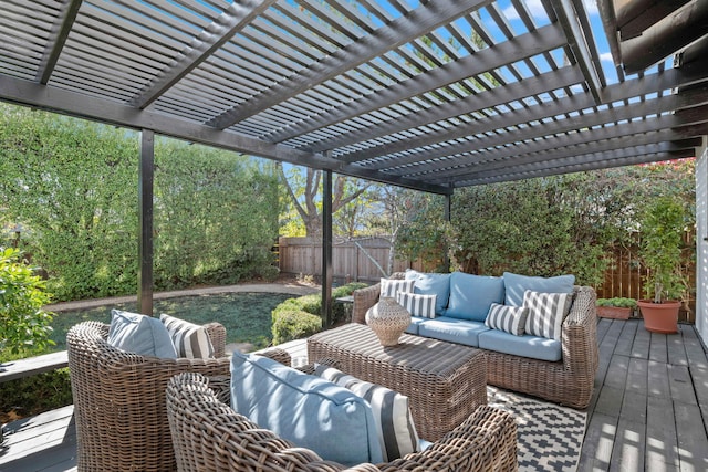 wooden deck featuring an outdoor living space and a pergola