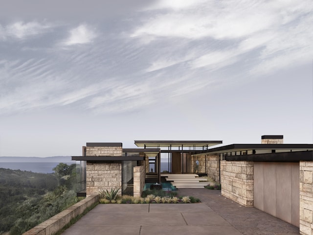 view of patio / terrace featuring a mountain view