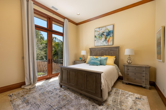 carpeted bedroom with crown molding, access to exterior, and french doors