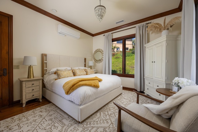 bedroom with a wall mounted air conditioner, crown molding, and light hardwood / wood-style floors