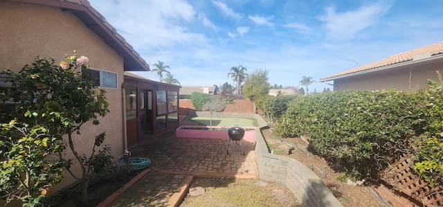 view of yard with a patio area