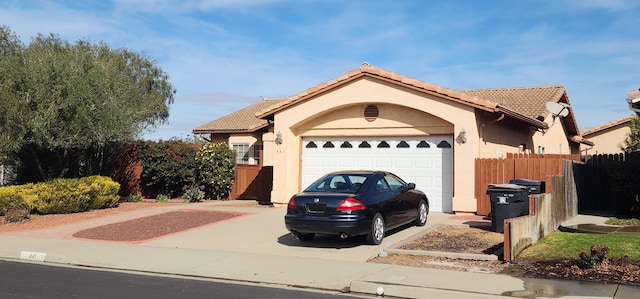 view of front of home with a garage