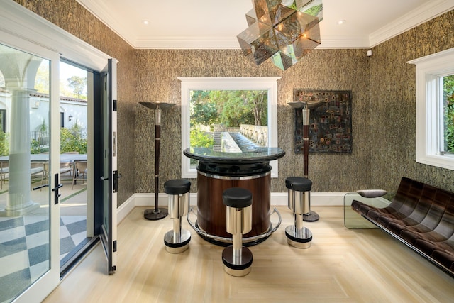 bar featuring parquet floors and crown molding