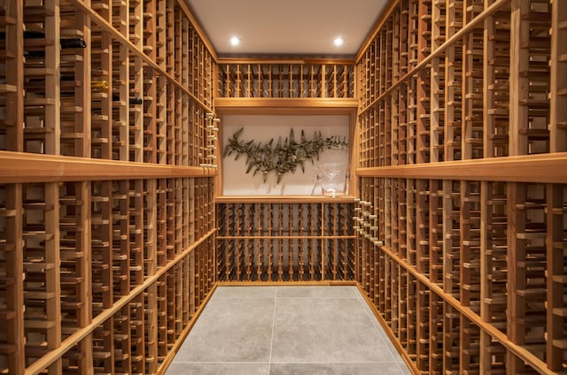 wine room featuring tile patterned floors