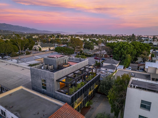 aerial view at dusk with a mountain view