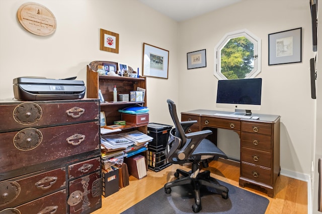 home office featuring light wood-type flooring