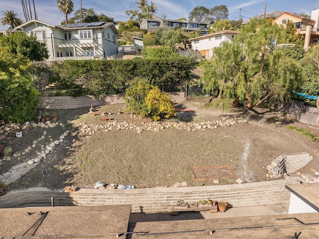 view of yard featuring a residential view