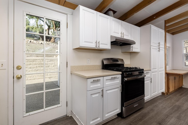 kitchen with stainless steel gas stove, under cabinet range hood, and white cabinets