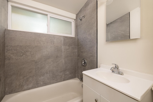 full bathroom featuring bathtub / shower combination and vanity