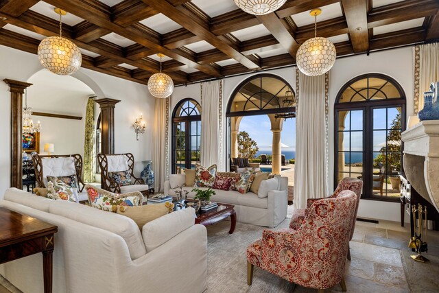 4230 Cresta Ave, Santa Barbara, CA 93110 - living room featuring coffered ceiling, beam ceiling, a premium fireplace, and ornate columns
