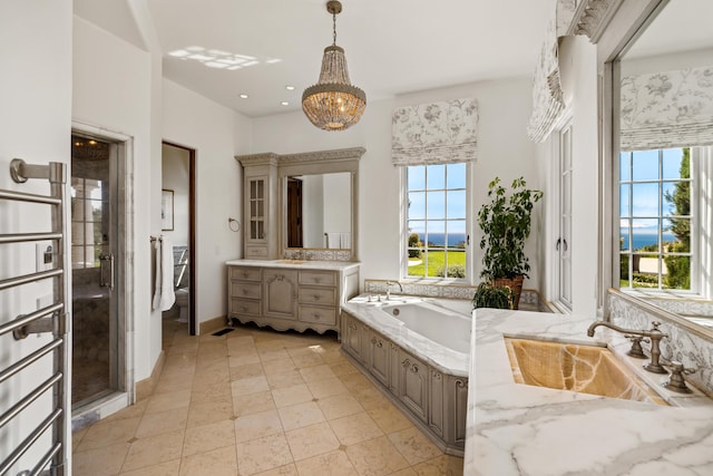 4230 Cresta Ave, Santa Barbara, CA 93110 - bathroom with vanity, separate shower and tub, and a notable chandelier