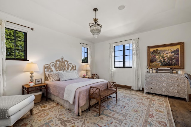 4230 Cresta Ave, Santa Barbara, CA 93110 - bedroom featuring an inviting chandelier and light wood-type flooring