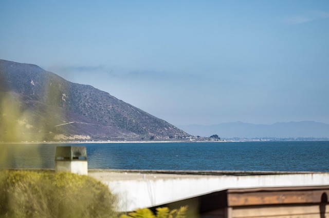 property view of water featuring a mountain view