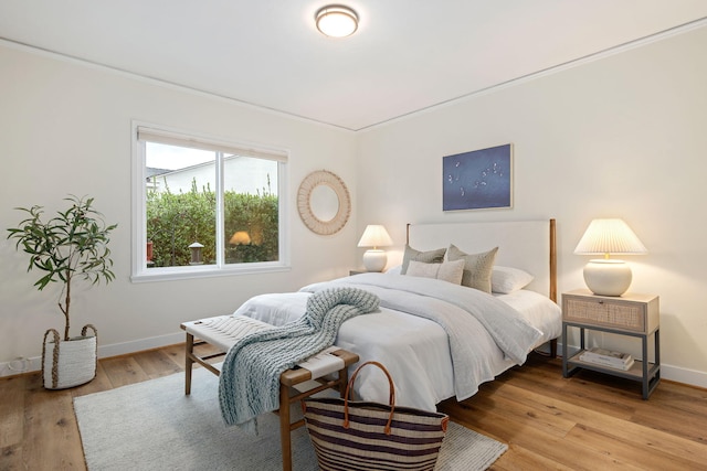 bedroom with light wood-type flooring