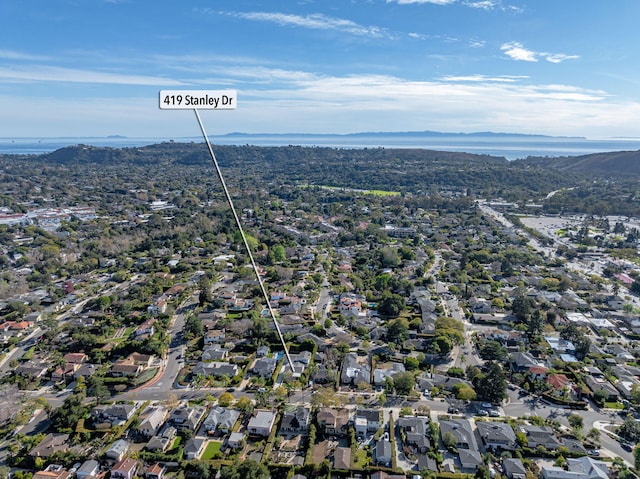 drone / aerial view featuring a mountain view