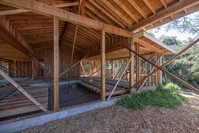 exterior space featuring lofted ceiling