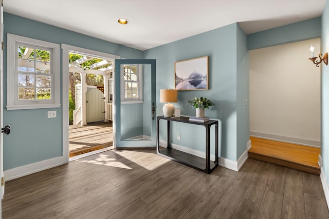 doorway to outside with hardwood / wood-style flooring