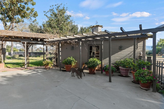 view of patio featuring a pergola