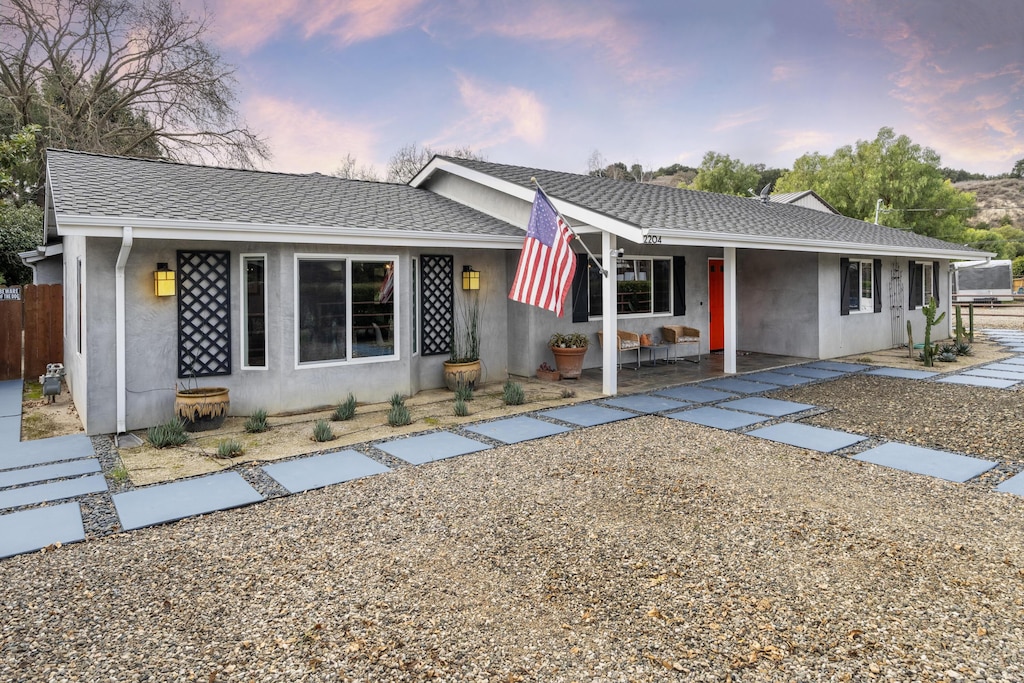 ranch-style house with a porch