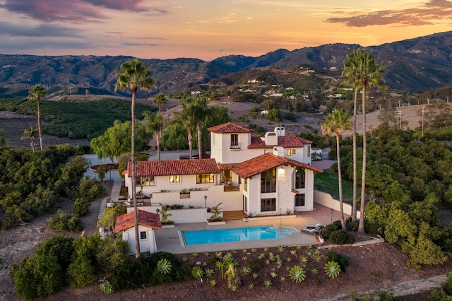 exterior space featuring a mountain view