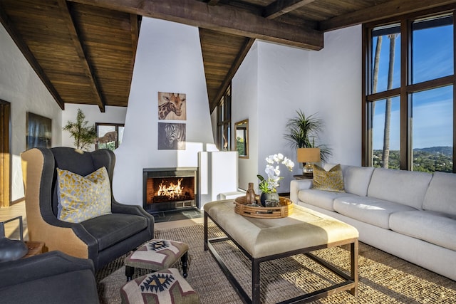 living room with high vaulted ceiling, beam ceiling, and wooden ceiling