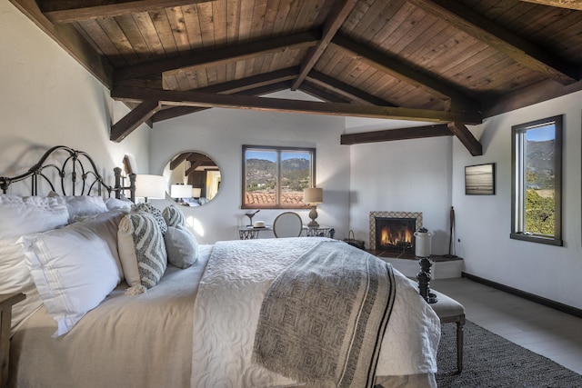 bedroom with multiple windows, vaulted ceiling with beams, wooden ceiling, and hardwood / wood-style floors