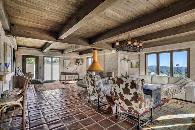 tiled living room with plenty of natural light, wooden ceiling, and beam ceiling