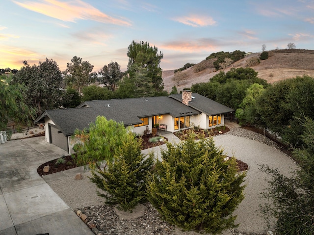 view of front of property with a garage