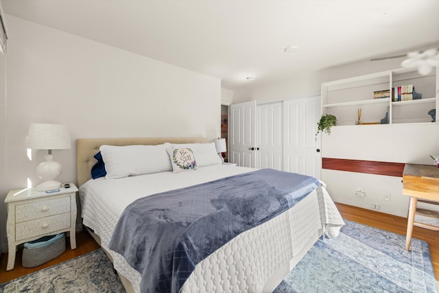 bedroom with wood-type flooring