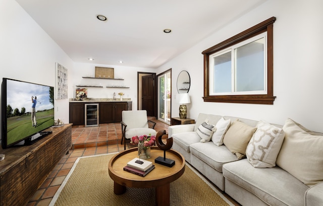 tiled living room with wet bar and beverage cooler