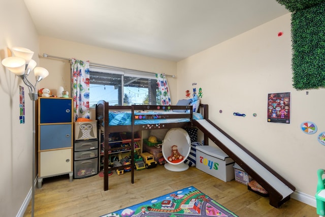 bedroom featuring wood-type flooring