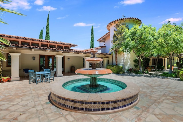 exterior space featuring a patio area and french doors