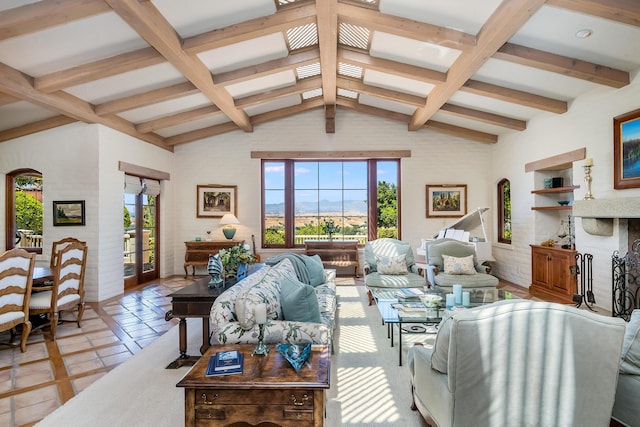 living room featuring plenty of natural light and vaulted ceiling with beams