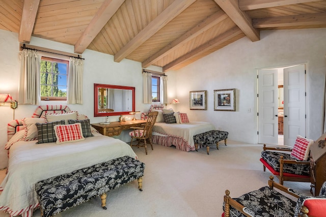 bedroom featuring carpet floors, vaulted ceiling with beams, and wood ceiling