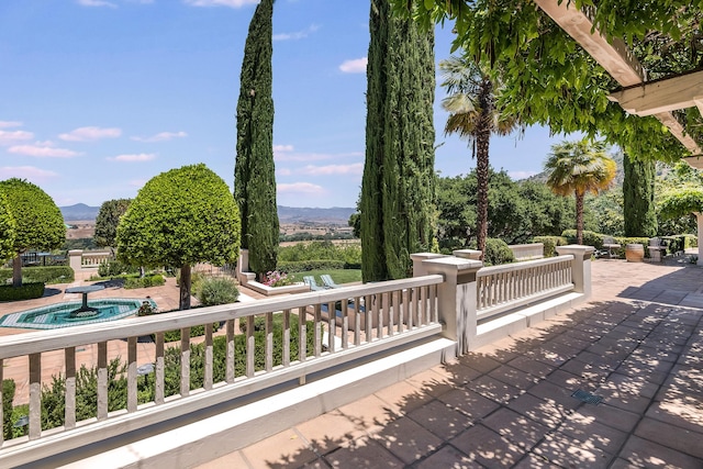 view of patio featuring a mountain view