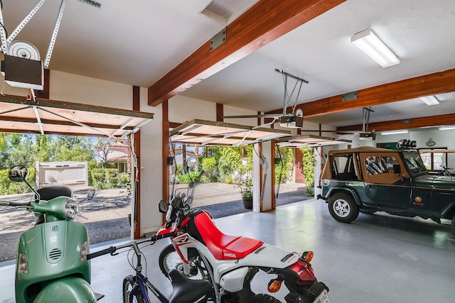 garage featuring a garage door opener