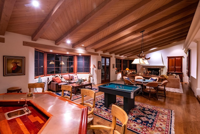 recreation room with sink, wood ceiling, lofted ceiling with beams, and hardwood / wood-style floors