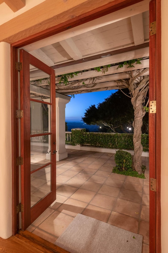 view of patio terrace at dusk