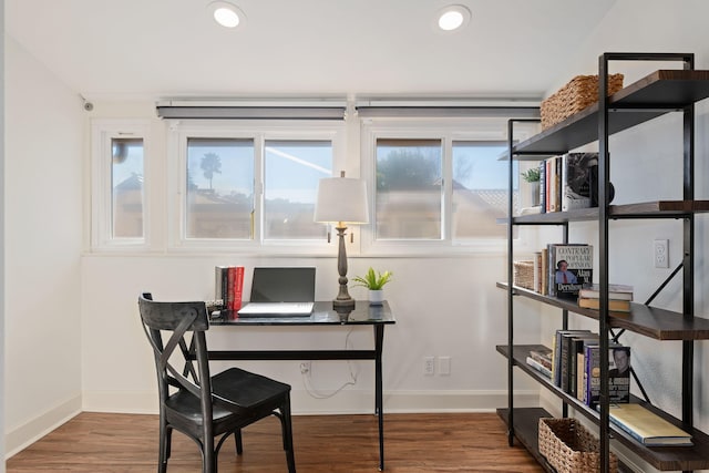 office space with hardwood / wood-style floors