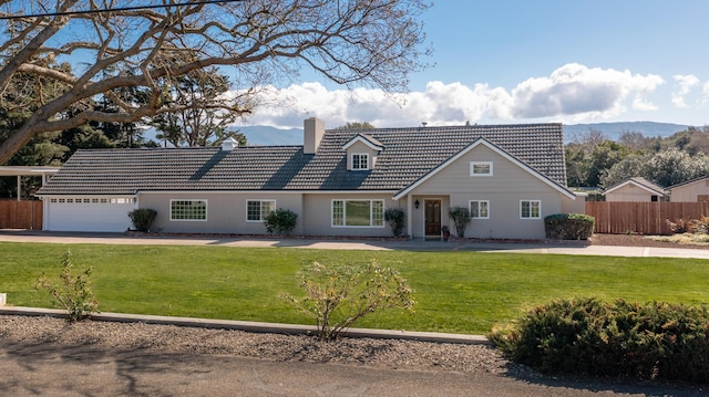 2385 Janin Pl, Solvang, CA 93463 - view of front facade featuring a garage, a mountain view, and a front yard