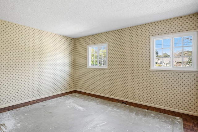 2385 Janin Pl, Solvang, CA 93463 - empty room featuring parquet floors and a textured ceiling