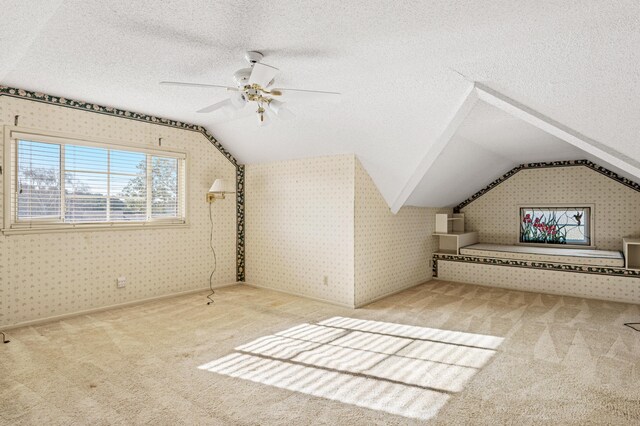 2385 Janin Pl, Solvang, CA 93463 - bonus room featuring ceiling fan, vaulted ceiling, a textured ceiling, and carpet