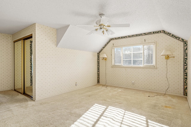 2385 Janin Pl, Solvang, CA 93463 - bonus room featuring ceiling fan, vaulted ceiling, a textured ceiling, and carpet