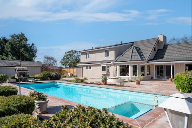 2385 Janin Pl, Solvang, CA 93463 - rear view of house with a fenced in pool and a patio area