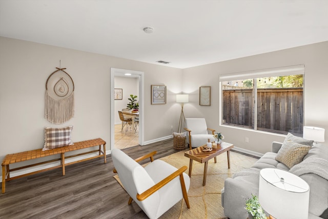 living room with hardwood / wood-style flooring