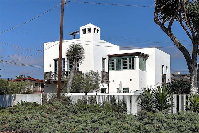 exterior space featuring a balcony