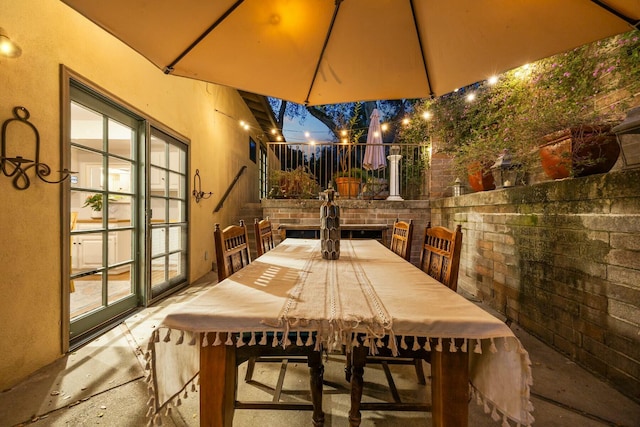 view of patio featuring outdoor dining area