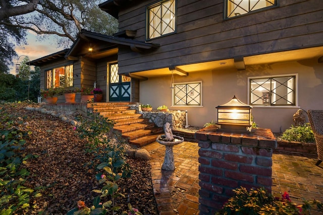 exterior space with stucco siding